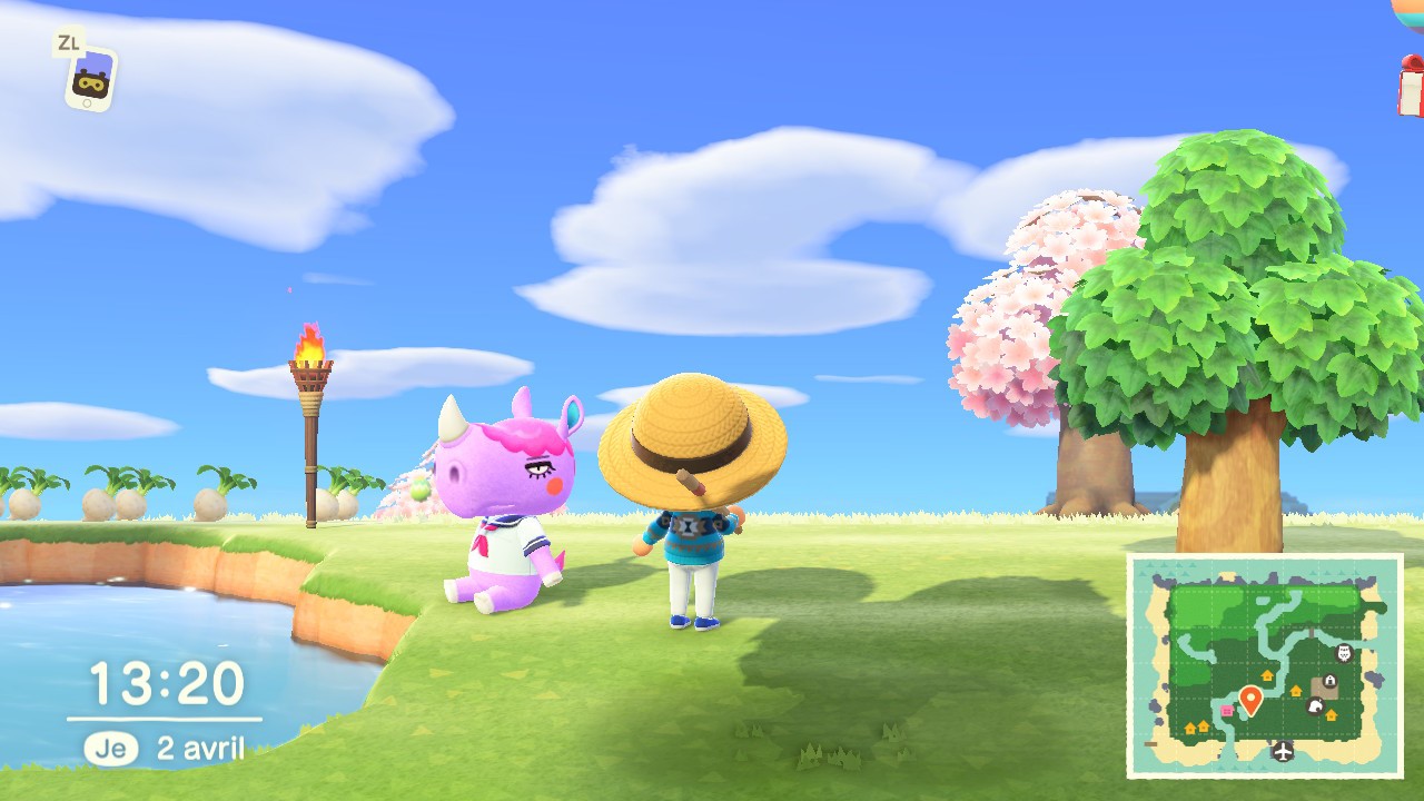 Personnage qui passe à côté d'une résidente assise au bord de l'eau dans Animal Crossing: New Horizons.